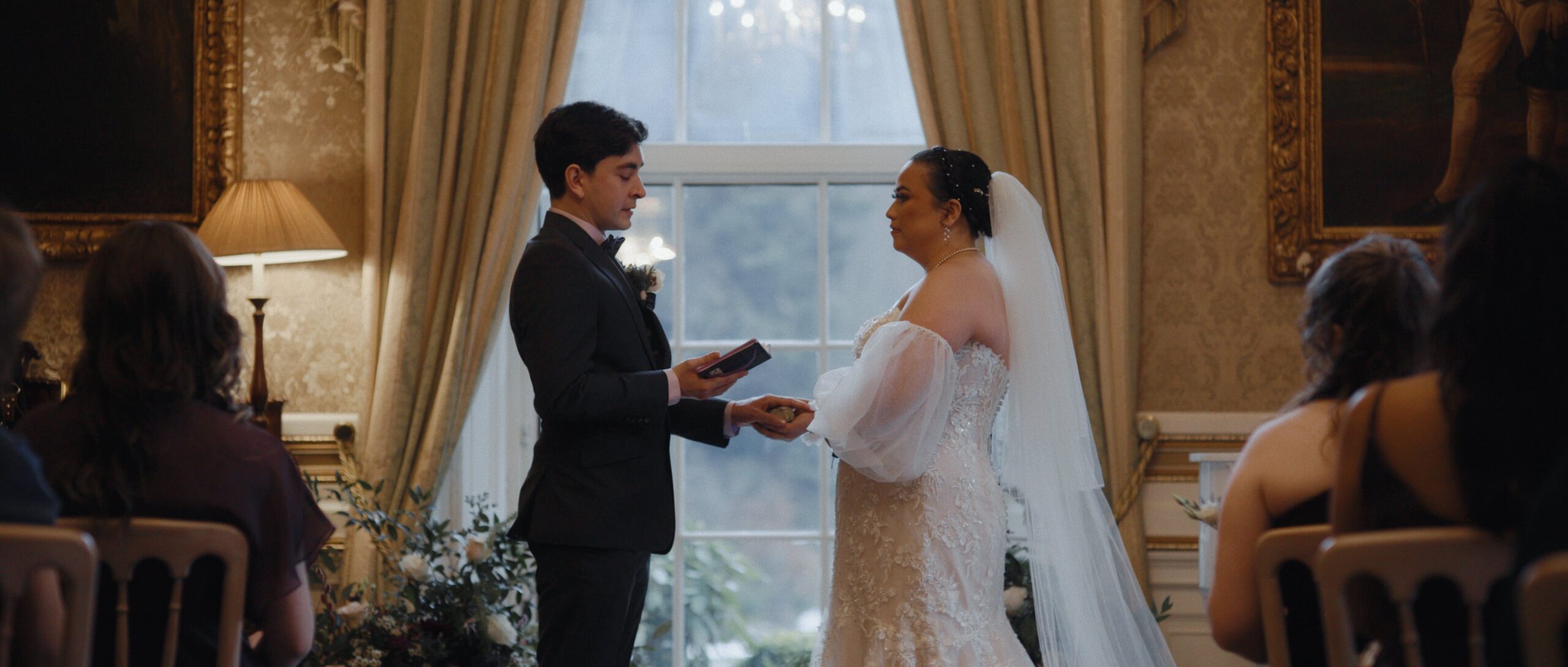 bride and groom exchange personal vows at Scottish castle