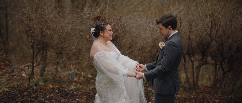 bride and groom look excited to see each other at their first look