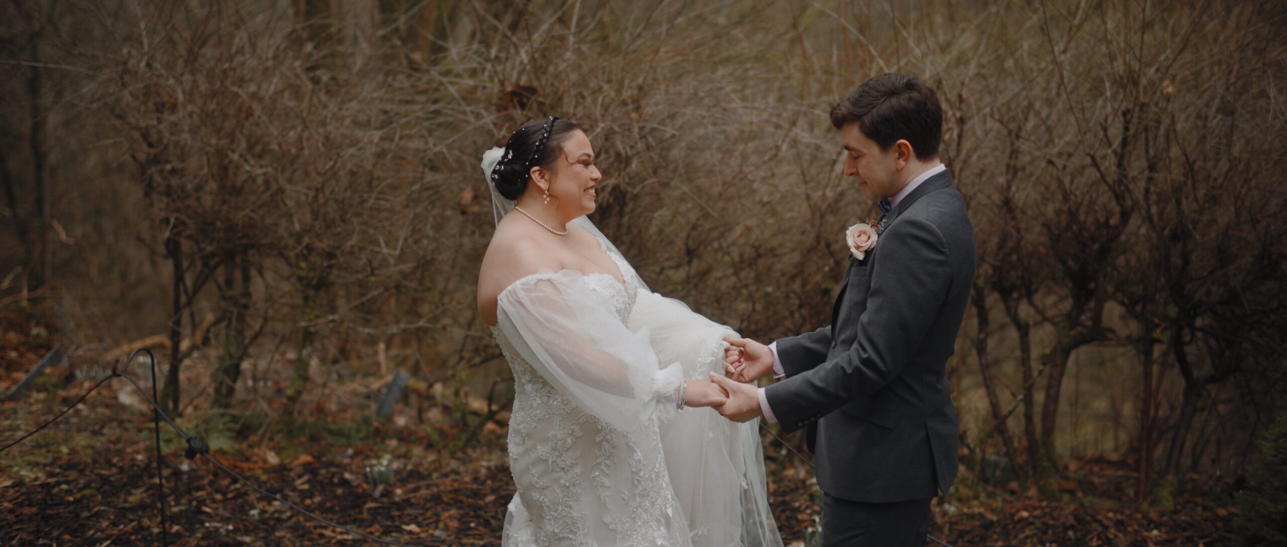 bride and groom look excited to see each other at their first look